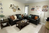 Leather sofas and coffee table in living room.