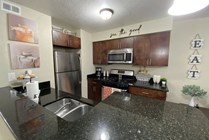 Kitchen Interior w/ stainless steel appliances